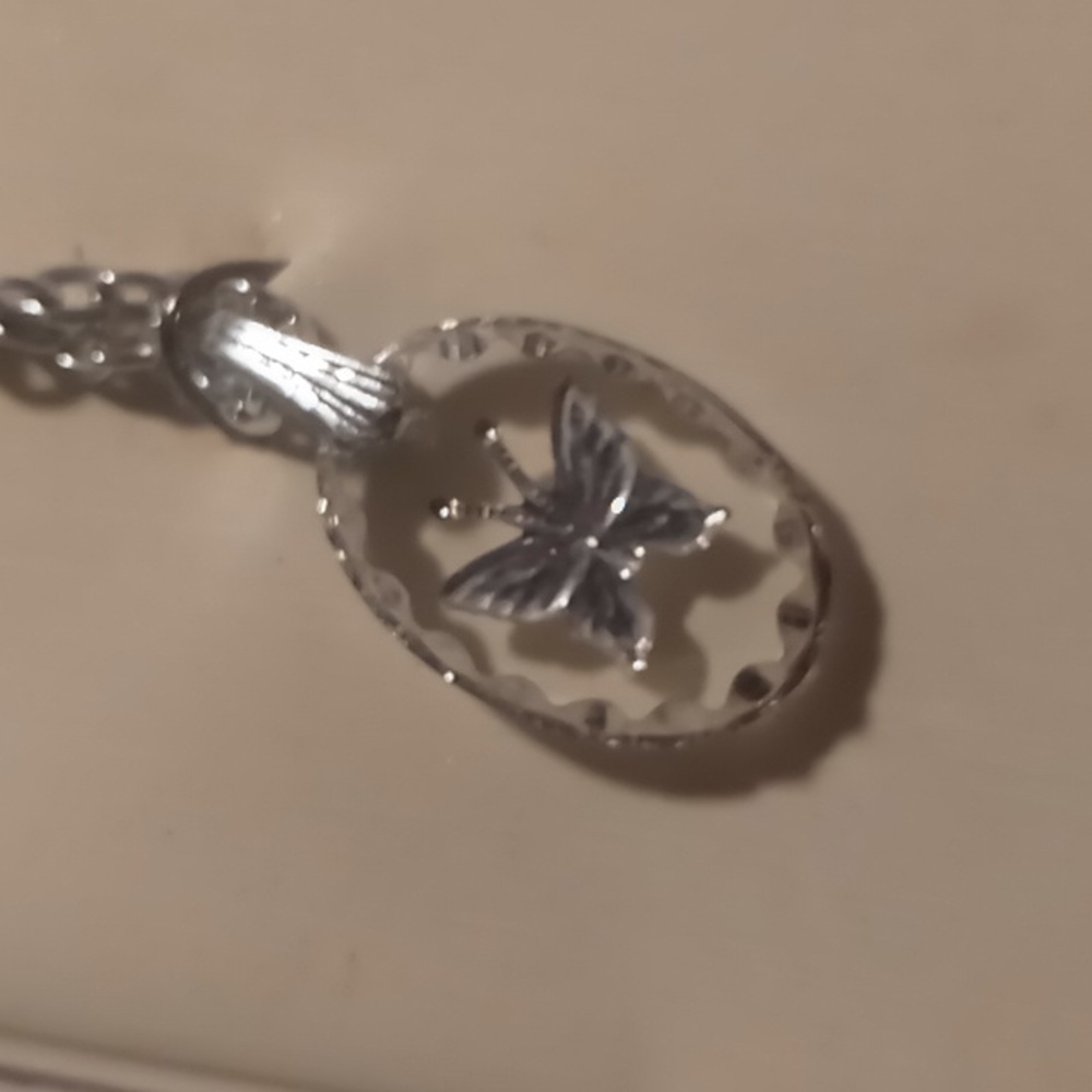 Vintage Lost sea Tennessee genuine crystal on a chain that will never tarnish .